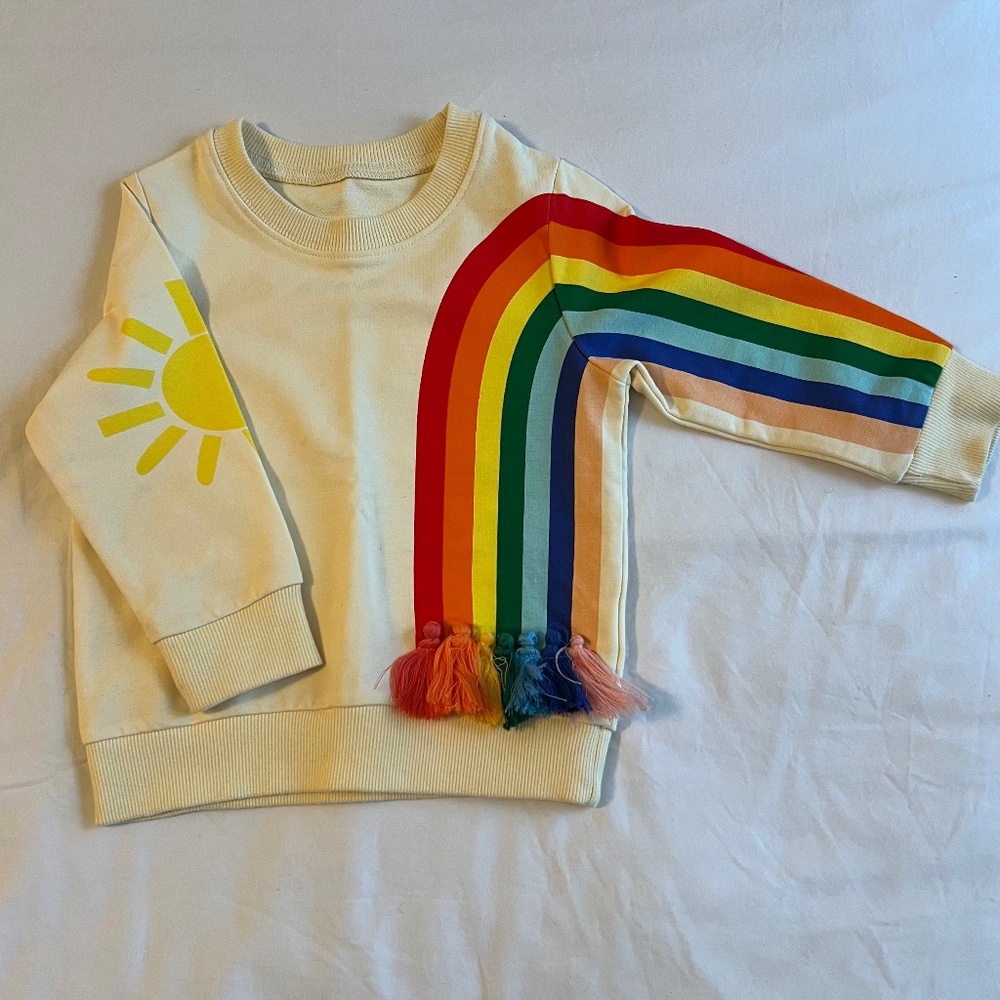 Rainbow with tassels and sun pull over
